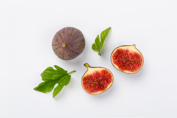 Fresh tasty fig fruits on color background, top view