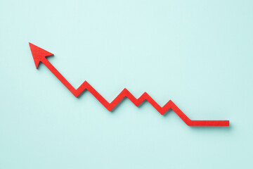 A red upward arrow on a light blue background, symbolizing growth or rising trends in finance or...