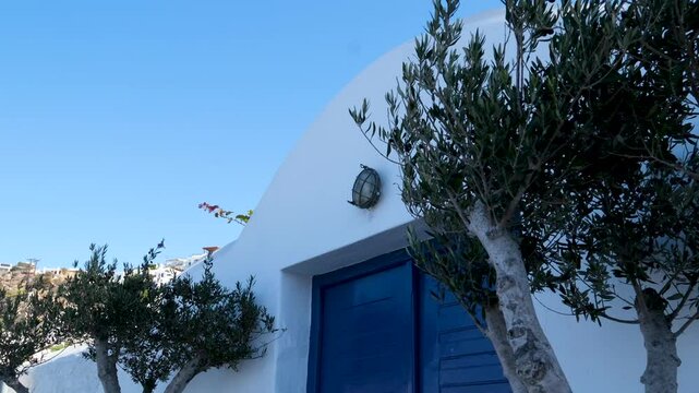 famous windmills of Mykonos island over seascape, Mykonos island, Greece. High quality 4k footage