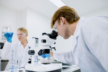 Science research laboratory, Scientist doctor work in science lab with science equipment microscope