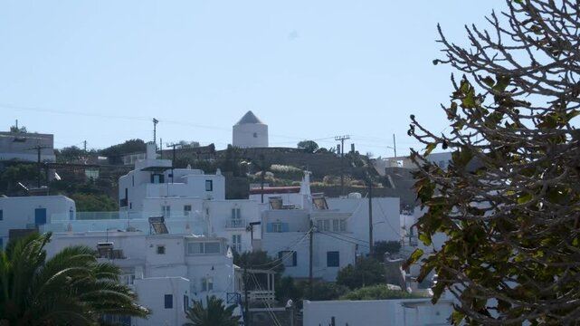 famous windmills of Mykonos island over seascape, Mykonos island, Greece. High quality 4k footage