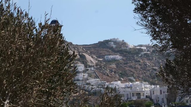 famous windmills of Mykonos island over seascape, Mykonos island, Greece. High quality 4k footage