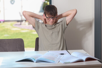 Teenage boy doing home work