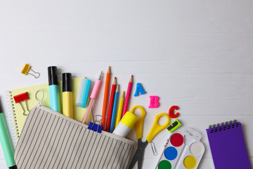 Back to School Supplies and Stationery on a Vibrant Background for a Fresh Start