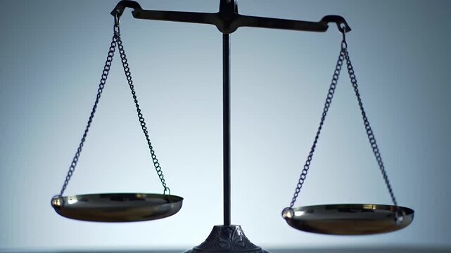 Elegant Brass Balance Scale with Intricate Chains and Weighing Pans on Soft White Background Representing Equilibrium and Fairness in Law and Justice
