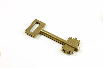 Brass key for opening the lock in the house.