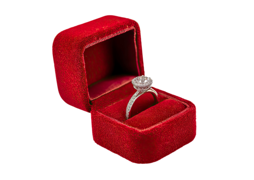 Diamond engagement ring in red velvet box on transparent background