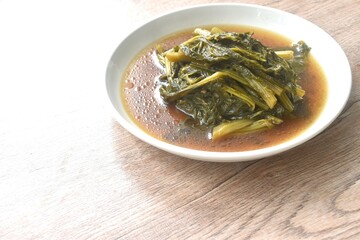 boiled spanich in sesame oil soup Chinese food on plate