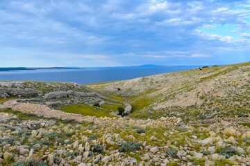 Rocky landscape at Krk island with the Adriatic sea behind at Kvarner, Croatia