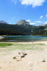 Black Lake Zabljak panorama with view of mountains and forest, Montenegro