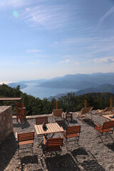 View of the Bay of Kotor from the top of the mountain. Chairs and tables on the top of the mountain