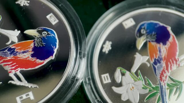 One thousand yen pure silver coin commemorating the 25th anniversary of the return of Amami Island to Japan.