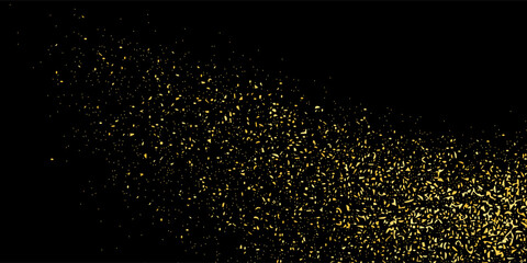Gold glitter texture on a black background. Golden explosion of confetti. Golden grainy abstract texture on a black background. Design element