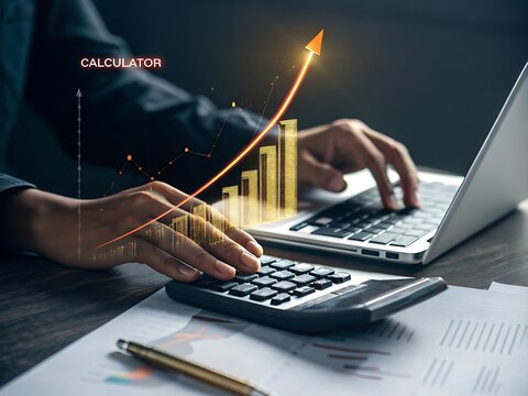 Person using calculator and laptop with glowing financial growth chart and data visualization