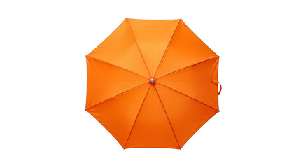 Open orange umbrella on black backdrop