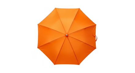 Open orange umbrella on black backdrop