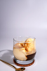 Italian Affogato drink, black coffee and ice cream
