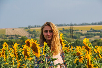 blonde woman, field, yellow sunflowers, portrait, looking into lens, smiling, teenager, bright...