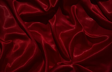 The luxurious red satin fabric surface is wavy and beautiful, conveying a deep love and relationship.