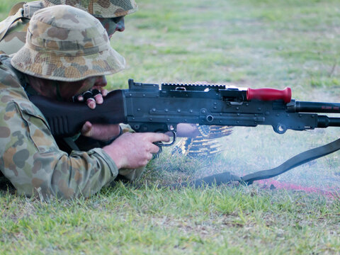 Australian Army Reserve Exercise - Two Soldiers Lying with Gun and Bullets