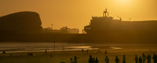 Fototapeta premium Golden sunset over the beach in matosinhos
