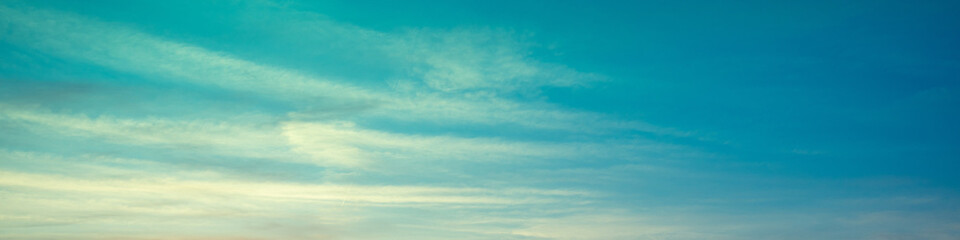 Blue sky with clouds. Cloudy sky background. Horizontal banner