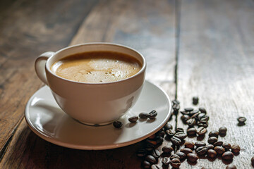 Coffee cup and coffee beans on wooden table, Espresso Crema coffee cup aromatic