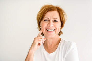 Fototapeta premium Senior casual woman style portrait, studio shot, isolated on white background