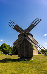 Traditional wooden windmill in Estonia countryside.