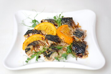 Raw stuffed fish close up. Dorado preparation, spices and oil.