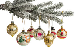 Vintage christmas ornaments hang from a tree branch isolated on transparent background
