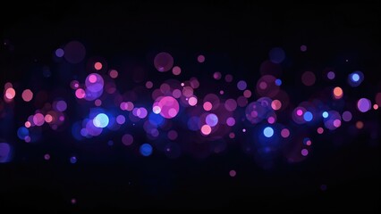 Colorful blue and pink light spots against a dark background