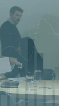 Animation of financial data processing over diverse business people in office