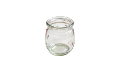 a clear glass jar placed against a contrasting dark background