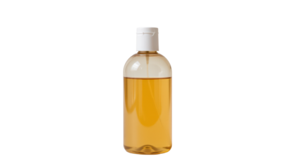 a tall, clear bottle filled with a yellowish liquid, standing against a black background