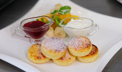 test cooking cheese curd pancakes with jam sour cream and banana pieces Step by step cut fruits...