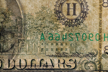 old dollars in face value of 100, close up, The money shines through from behind with a bright light