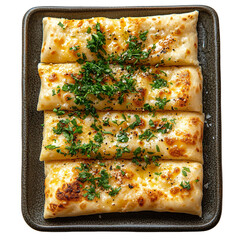 Top view of a delicious looking etli ekmek on a dark rectangular plate isolated on a white transparent background.