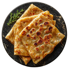 Top view of a delicious looking gozleme on a dark marble plate isolated on a white transparent background