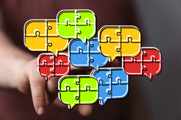 Colorful puzzle pieces represent teamwork, communication, and problem-solving.