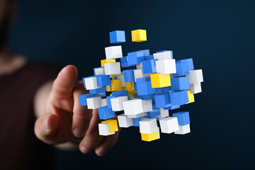 Abstract image of data blocks connecting, symbolizing technology, innovation, and digital...