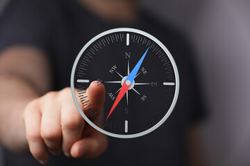 Find your direction.  Modern compass app interface on touchscreen.  Concept of navigation,...