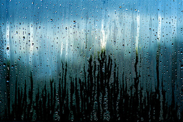 Water and rain drops on the glass, abstract view, Drops of rain on blue glass background, drops on...