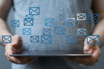 Person using tablet, connected email network, digital communication, global network, technology,...