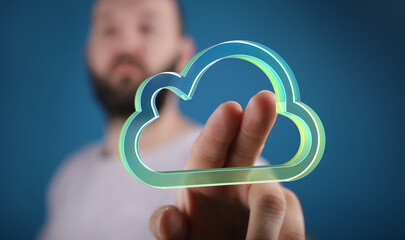 Close-up of a man's hand interacting with a digital cloud icon, representing cloud computing and...