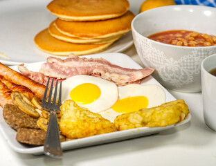 breakfast with fried eggs and bacon