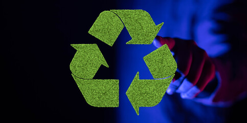 Eco-friendly recycling concept.  Grass symbol on digital screen. Sustainable future.