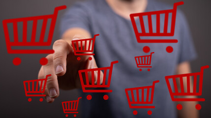 Person interacts with virtual shopping carts, symbolizing online shopping and e-commerce.