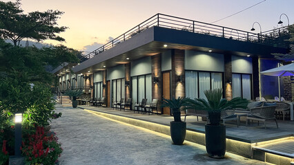 Home villa hotel with garden view of a tropical luxurious at sunset