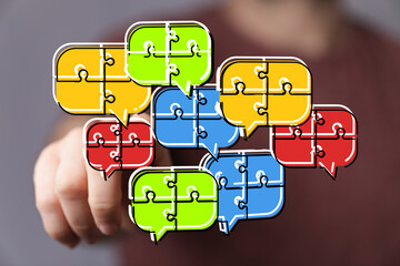 Abstract image of puzzle pieces forming speech bubbles, symbolizing communication and collaboration.